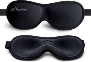 Contoured sleep mask on pillow for a light-free night routine